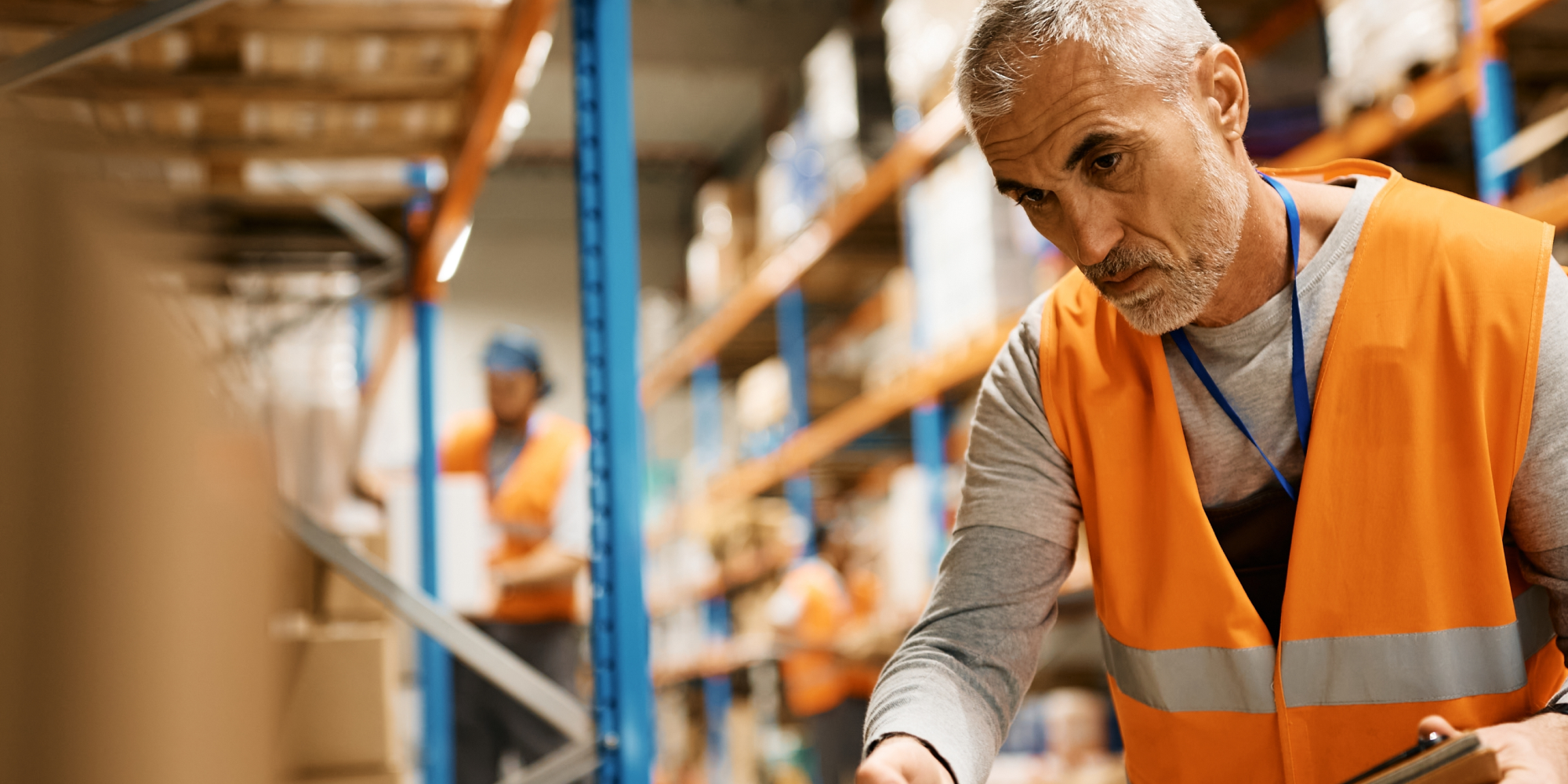 Warehouse Worker Checking Inventory